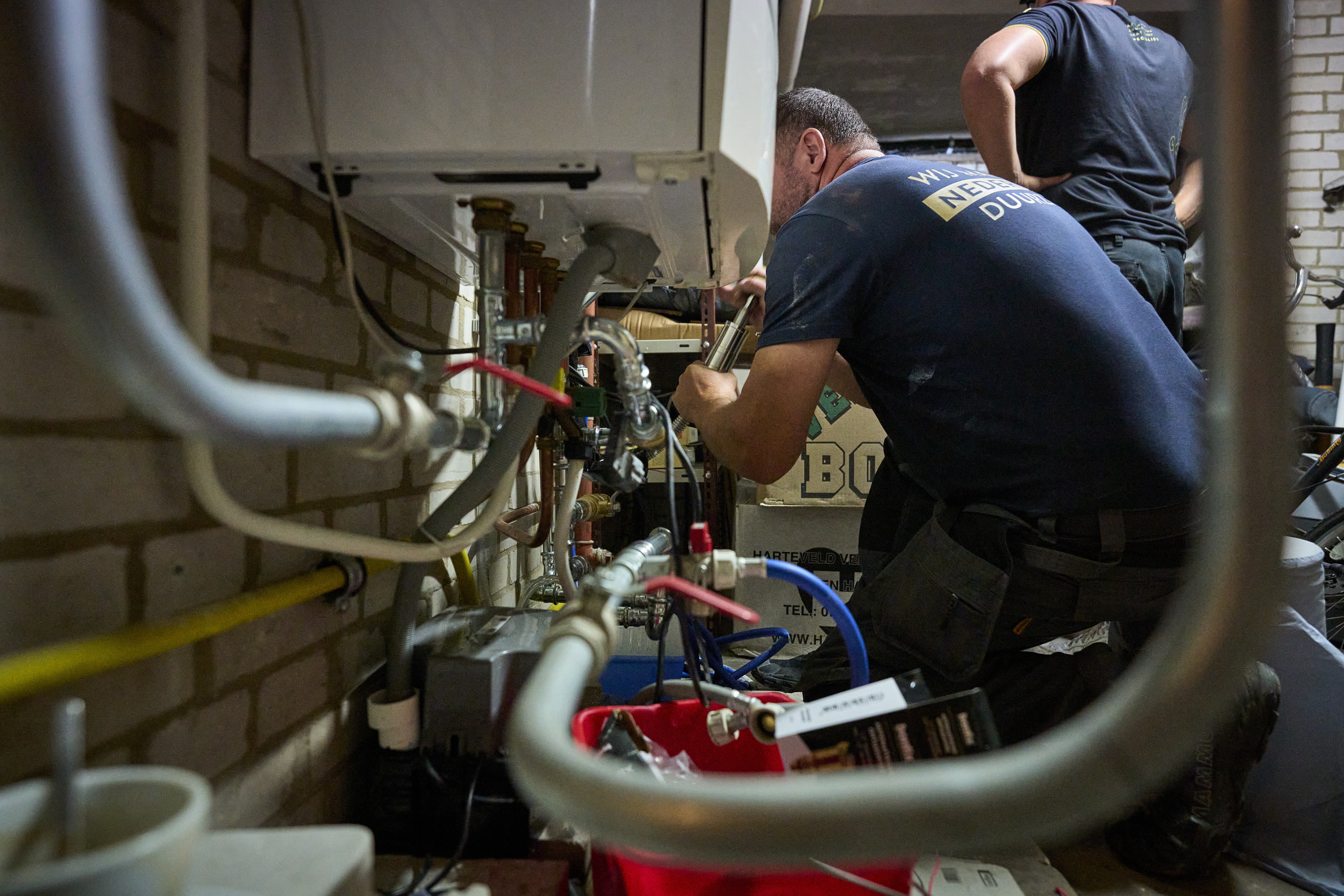 Plaatsing van een hybride warmtepomp. Foto: ANP Hollandse Hoogte/Phil Nijhuis.